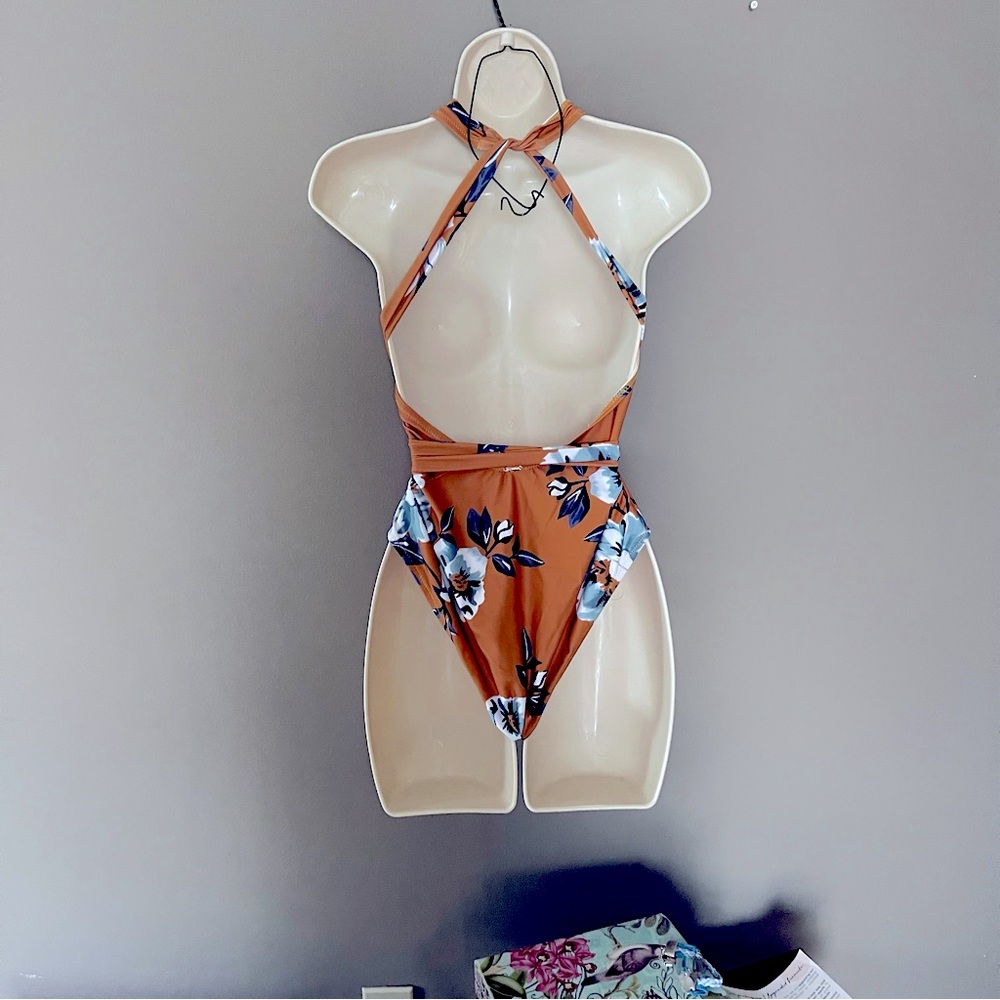 Small one piece swimsuit by Kamoni.